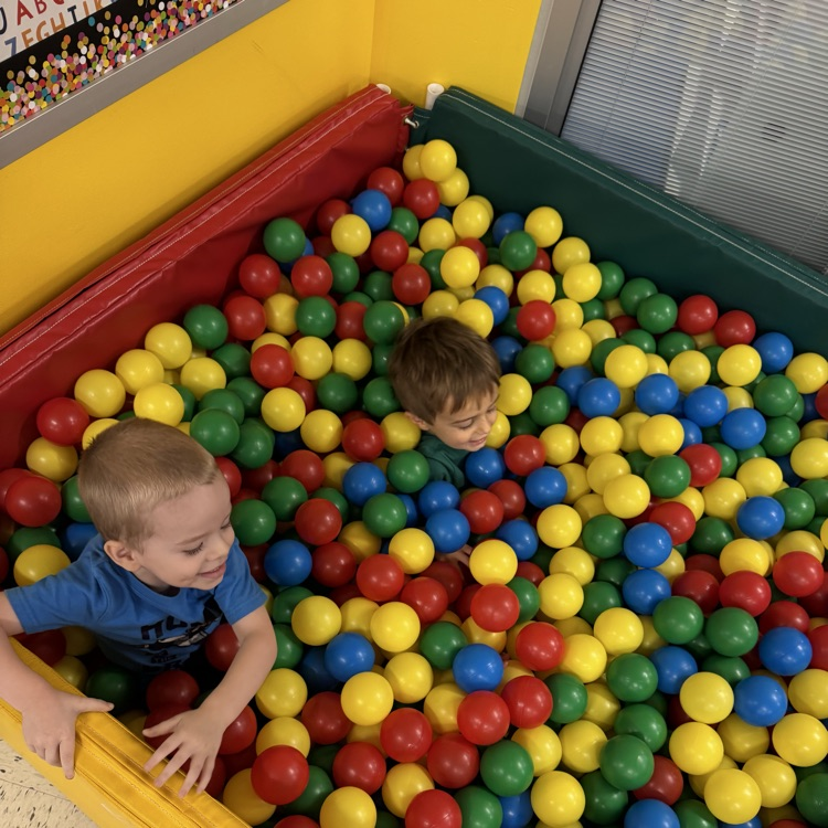 Students in the ball pit in preschool