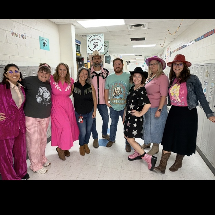 staffulty members dressed up as Dolly Parton