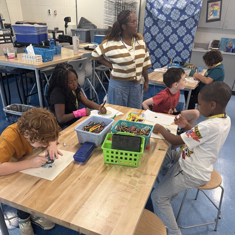 students expressing themselves while drawing