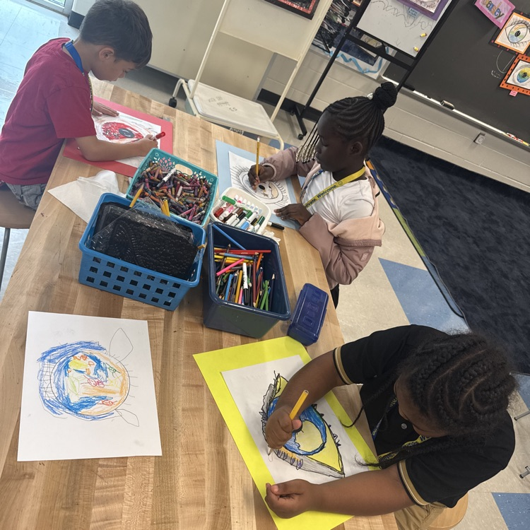 students expressing themselves while drawing