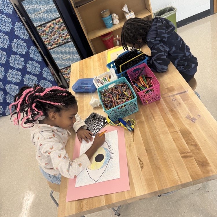 students expressing themselves while drawing