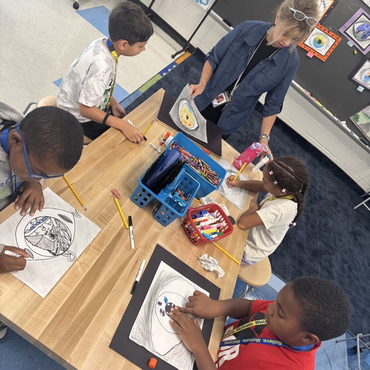 students expressing themselves while drawing
