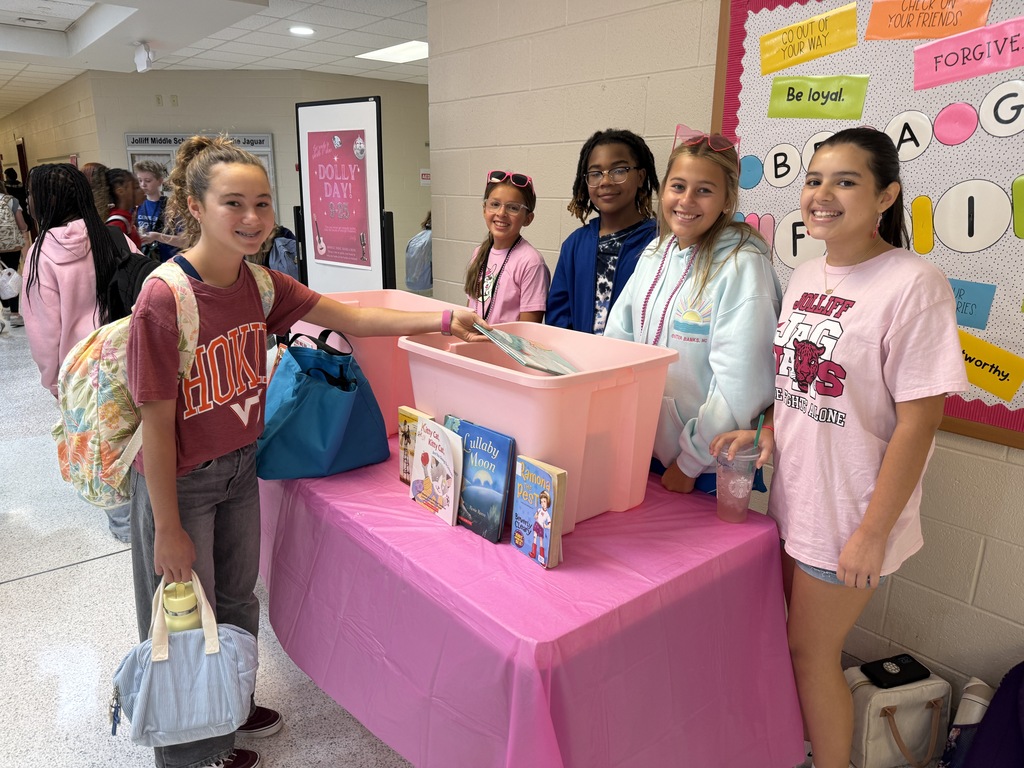 Student donating used books to SCA members