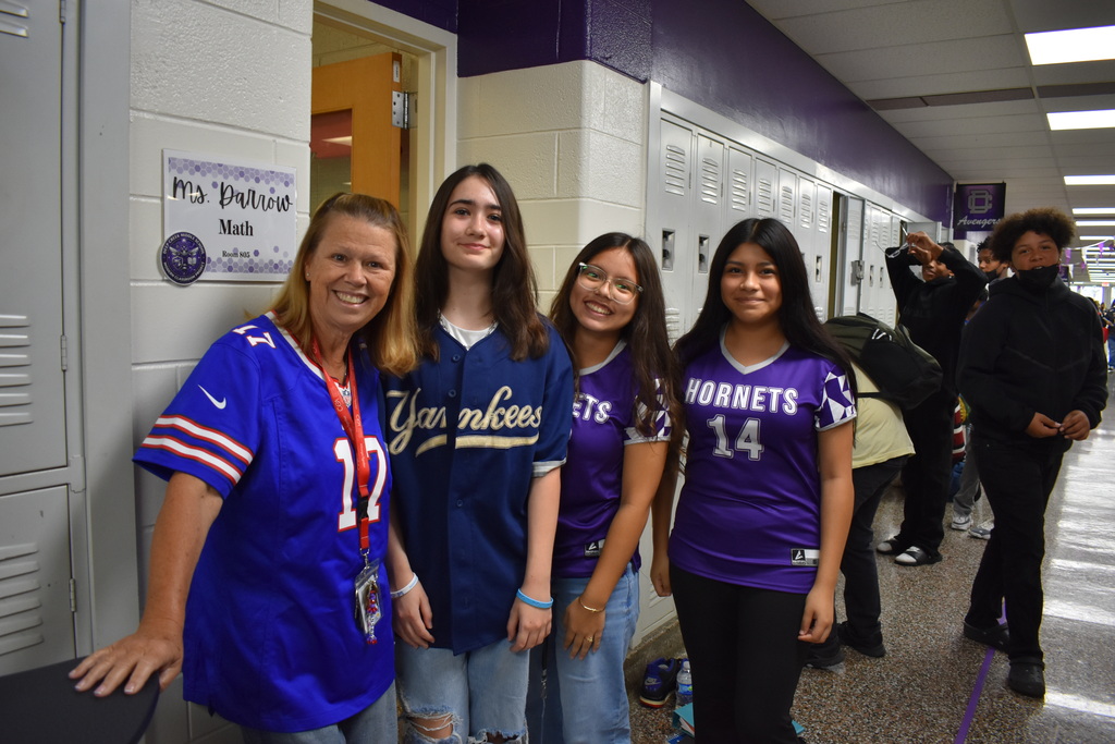 Teachers and students posing for jersey Day!