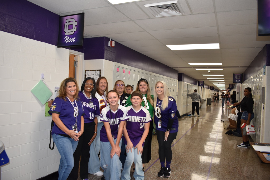 Teachers and students posing for jersey Day!