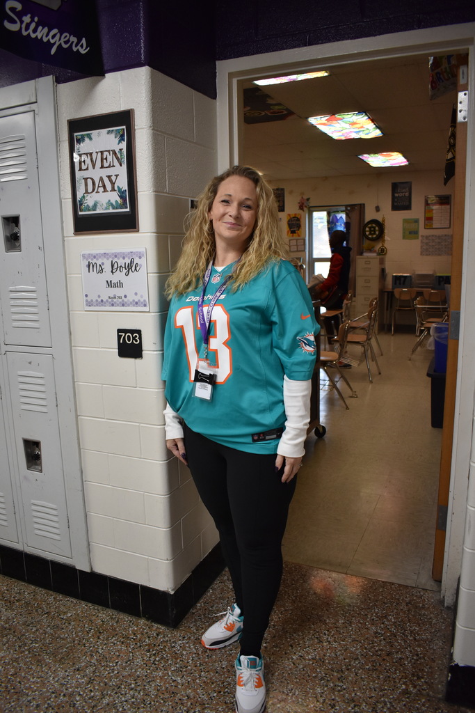 Teachers and students posing for jersey Day!