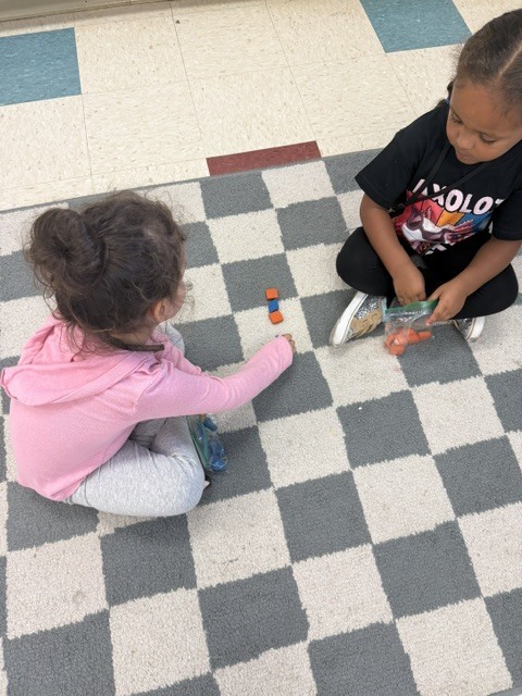 students creating patterns with manipulatives