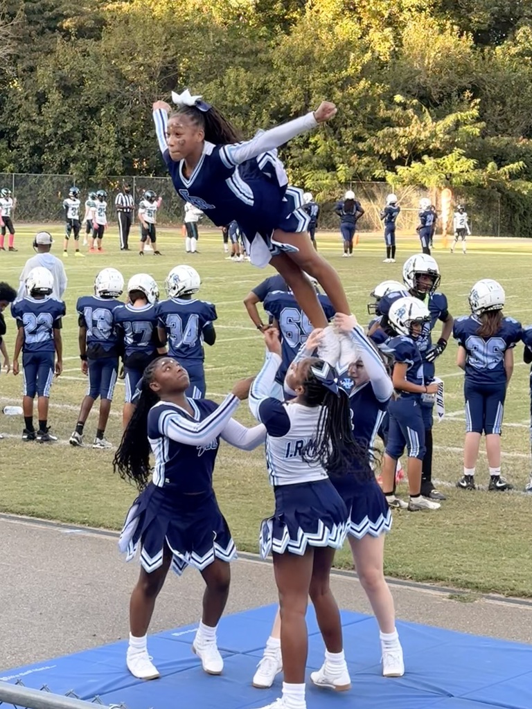 cheerleaders performing stunts 