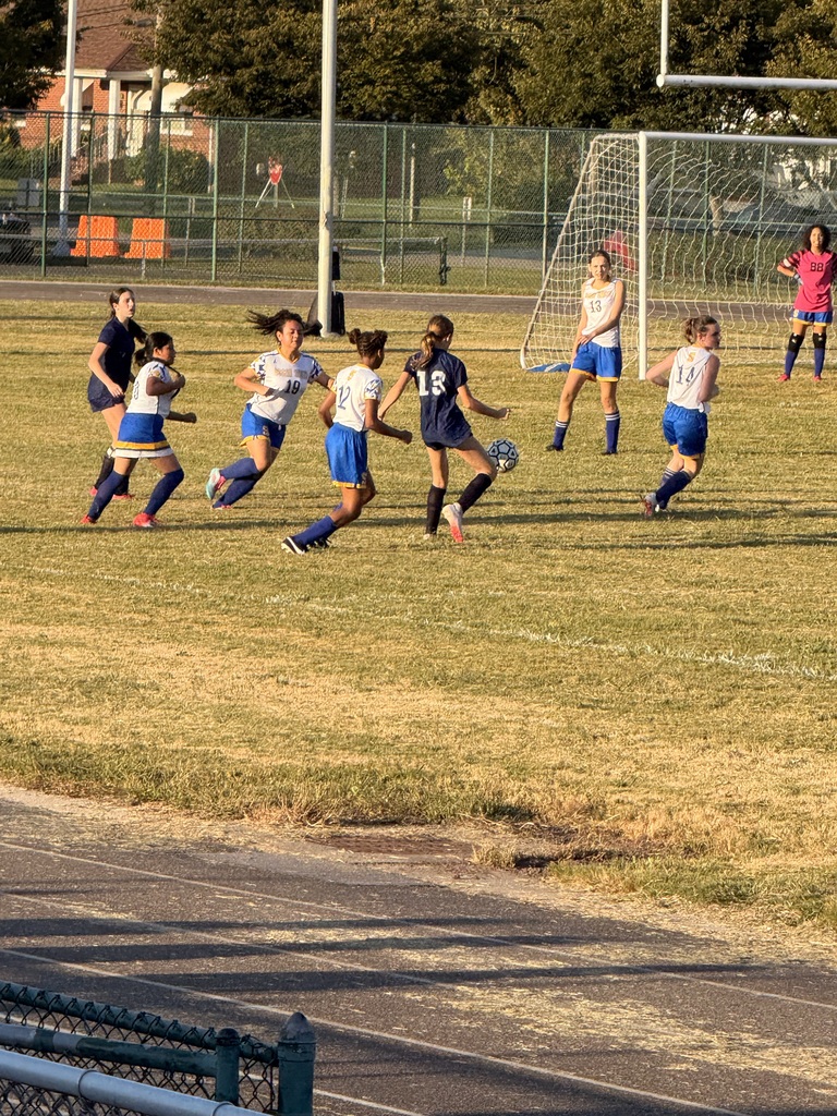 middle school girls playing soccer