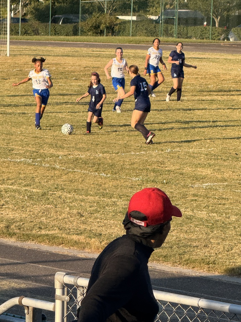 middle school girls playing soccer