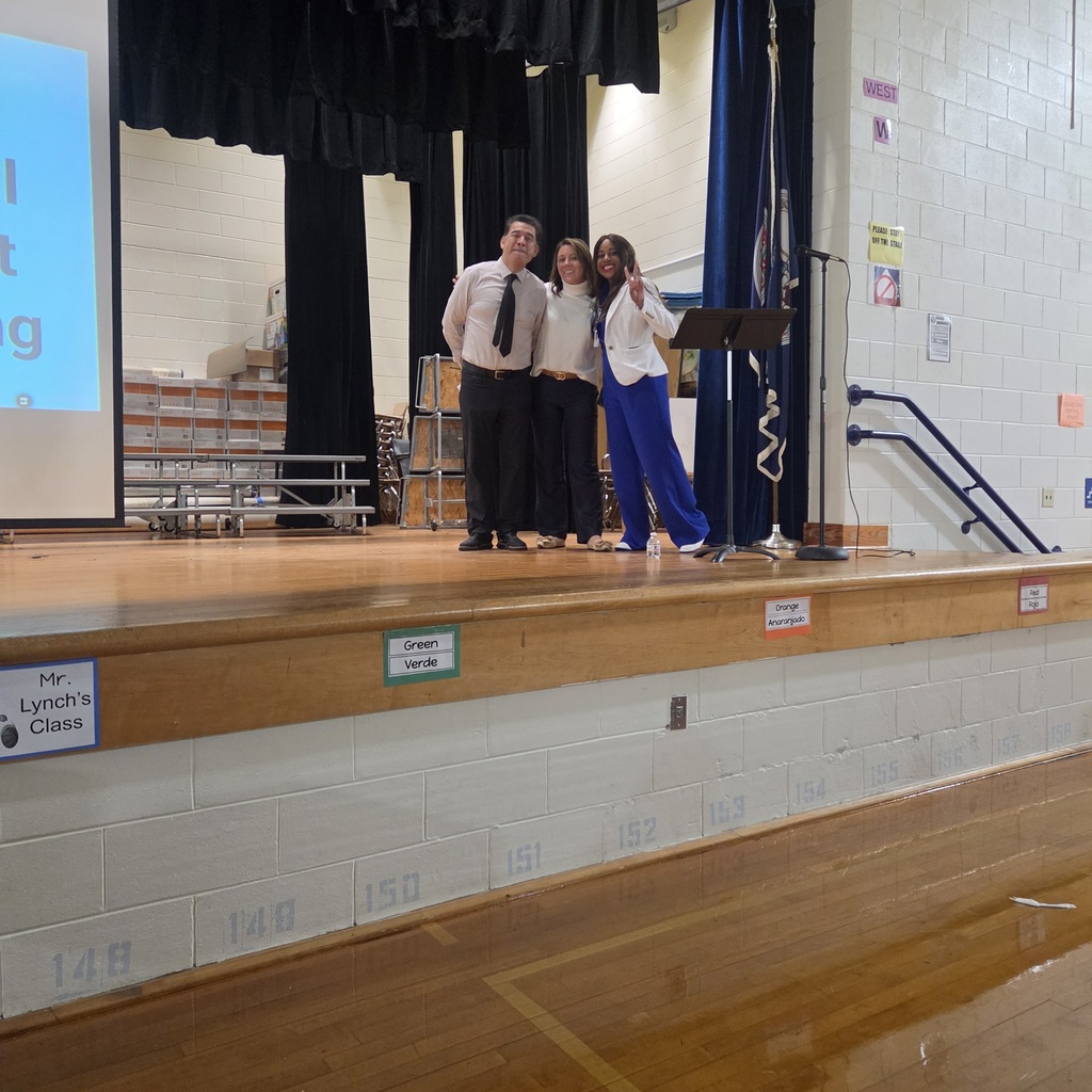 David Albor (administrative specialist), Ashely Gurkin (assistant principal), and Khadijah Alexander (principal) pose before delivering their Title I presentation