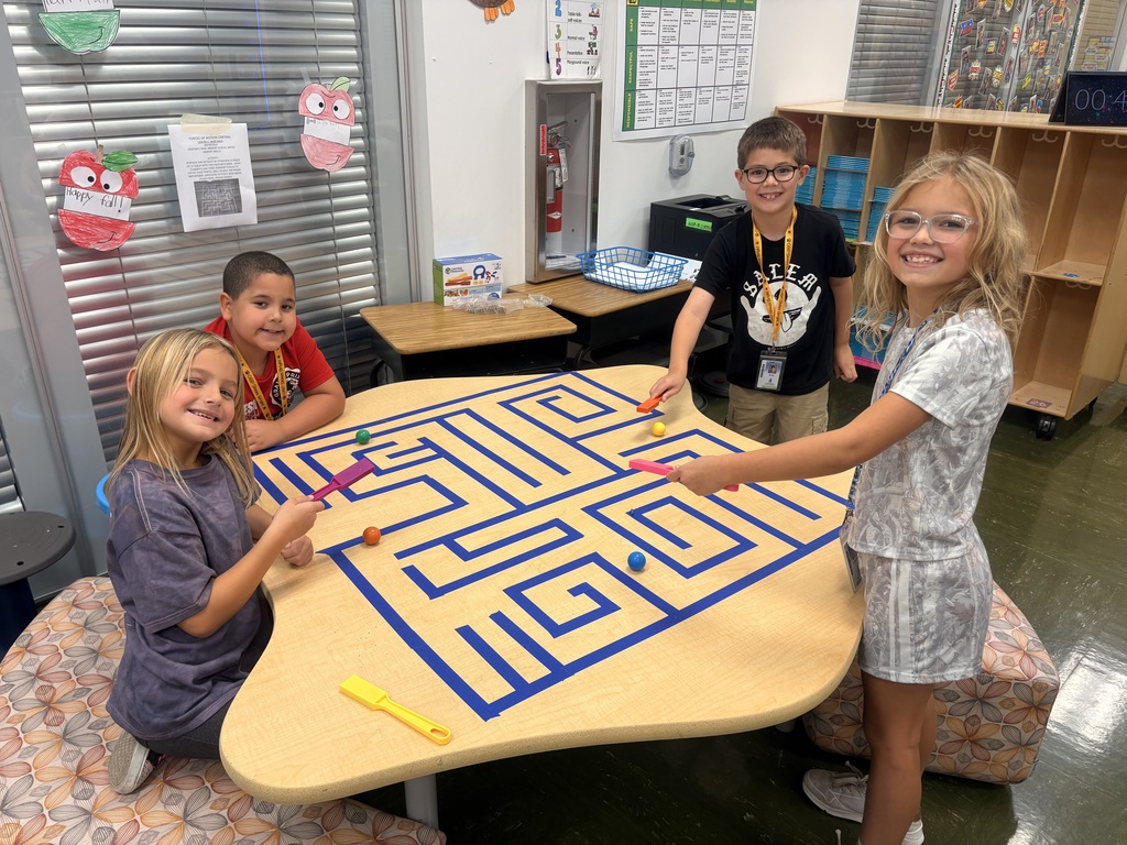Ms. Shinn's second graders doing their magnet maze.
