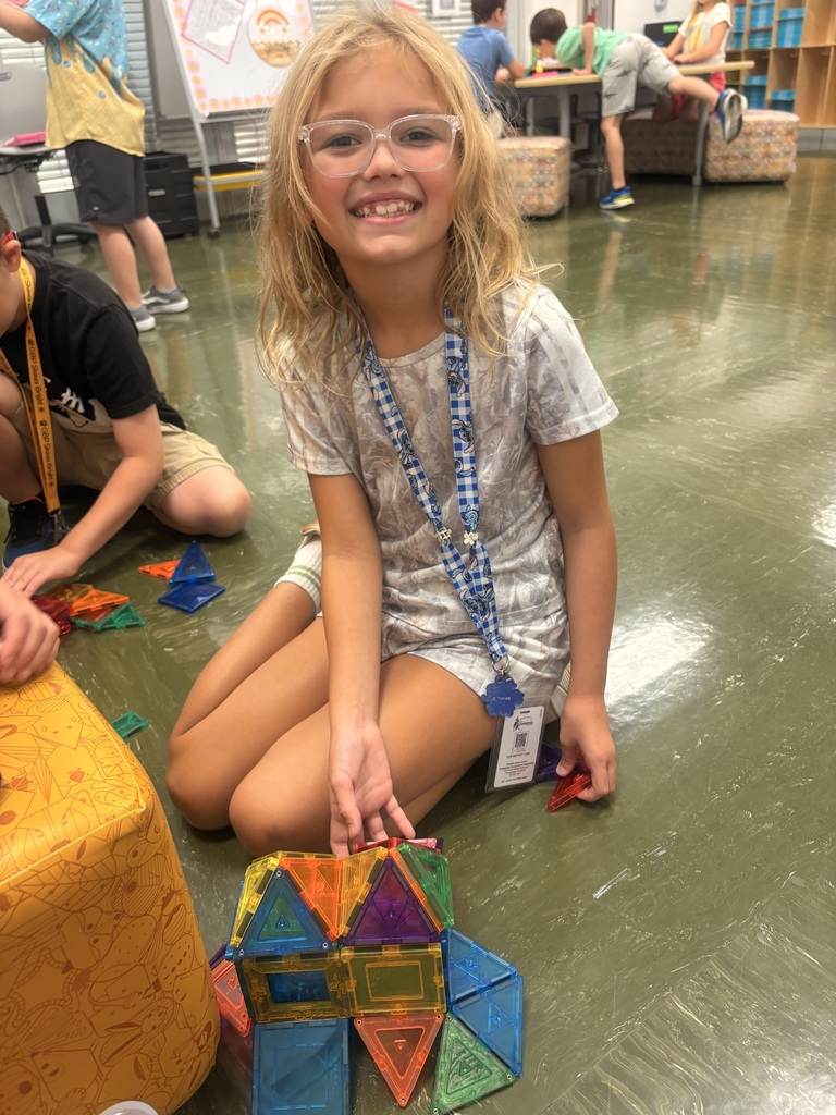 Student showing off her magnetile masterpiece.