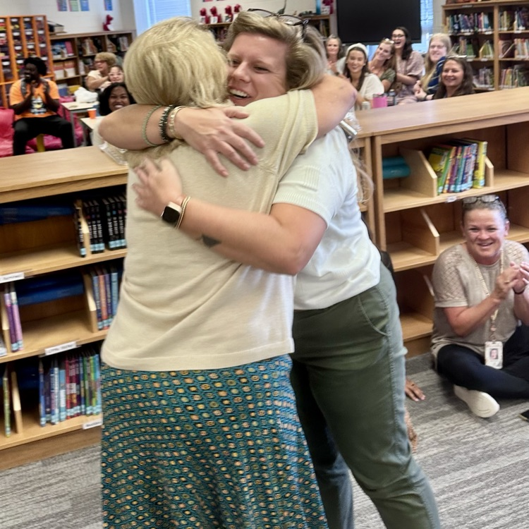 Ms. Cross celebrating.