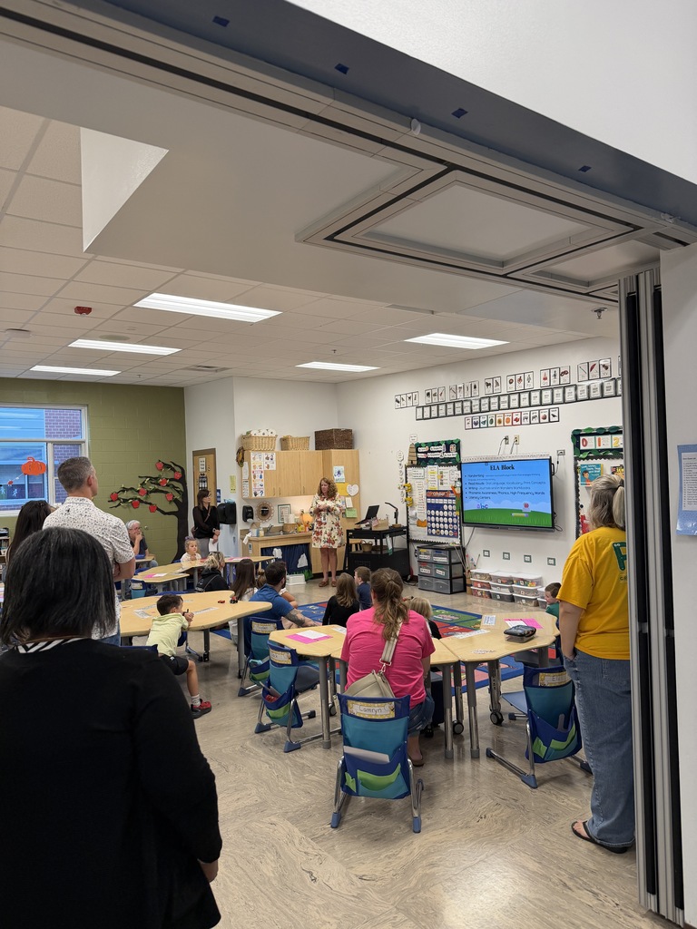 Ms. Dow presenting to her parents at Open House.