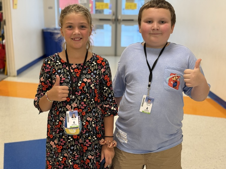 two students smiling