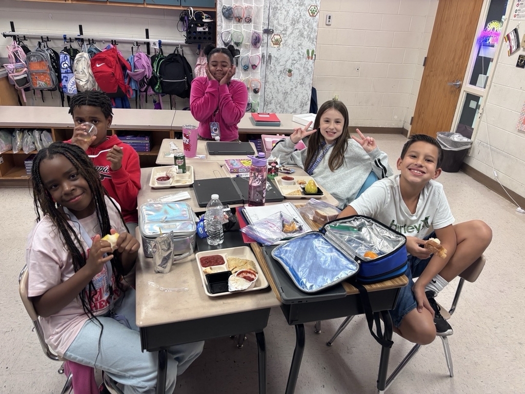 students eating lunch in the classroom