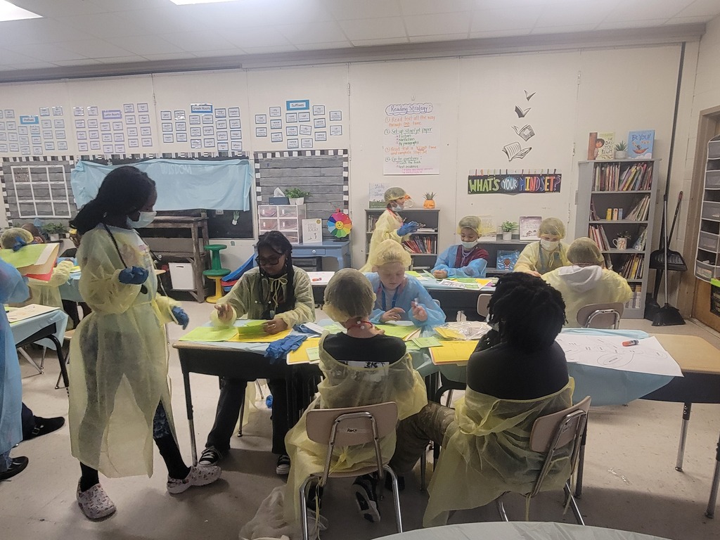 Students in scrubs doing order of operations