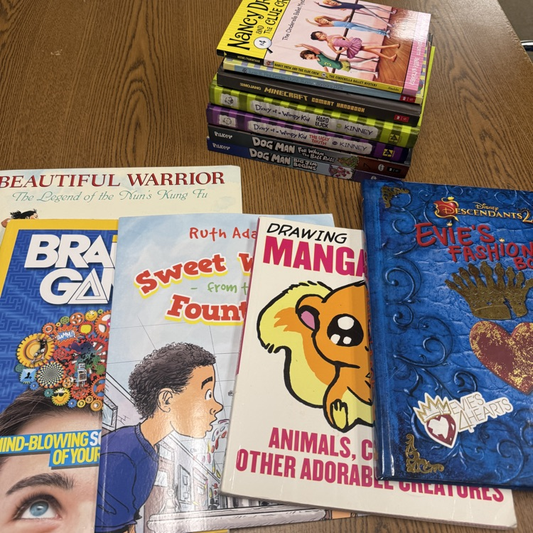 books laid out on a table