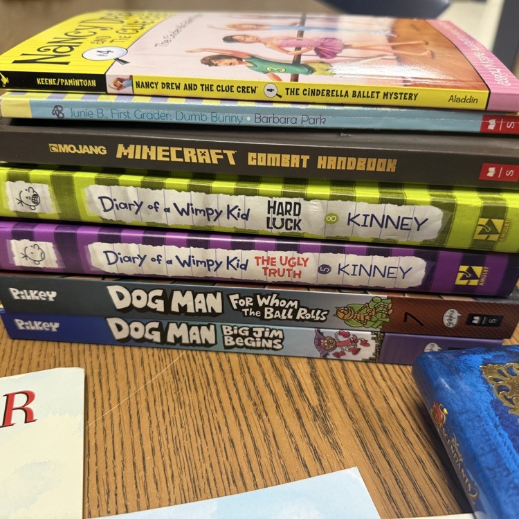 books stacked on a table