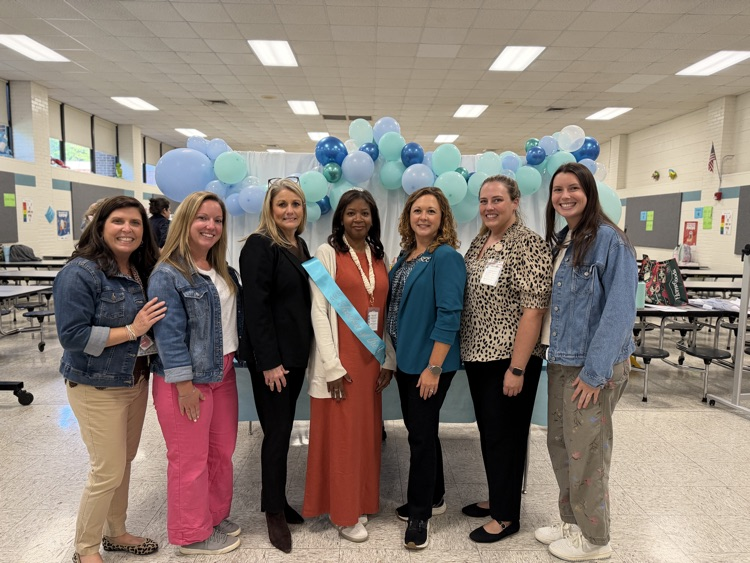 the Teacher of Year team honoring our new TOY