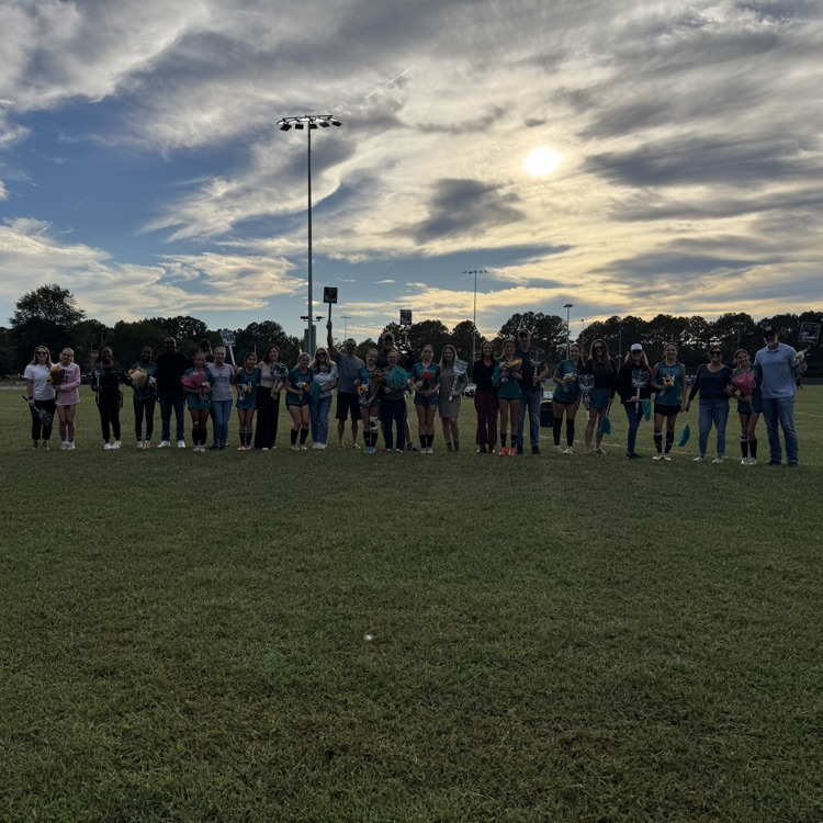 picture of our 8th grade girls on the soccer team and their families