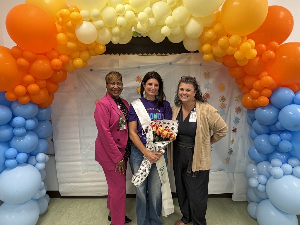 Ms. Baker-Hardison and Ms. Taylor posing proudly with our newly named Teacher of the Year, Ms. Wendy Shinn