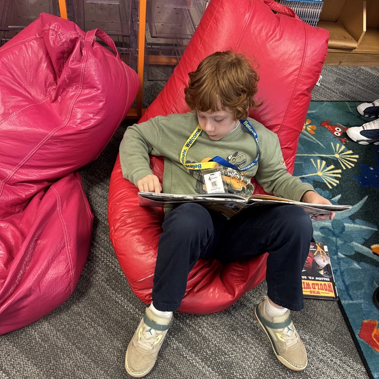 students reading in the library