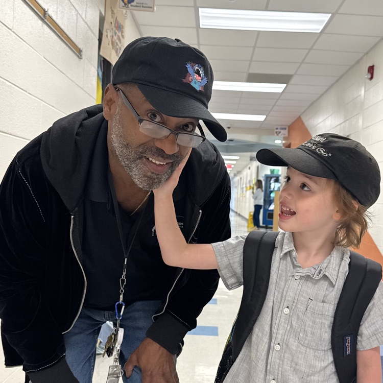 Mr Crenshaw bringing joy to a student.