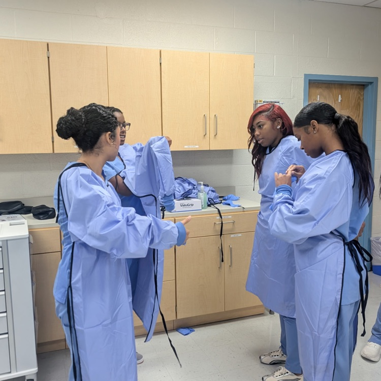 patient care tech students practicing skills