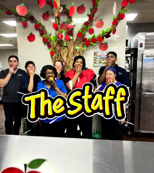 The JMS cafeteria staff participating in the Crunch heard around the Commonwealth event by biting into apples