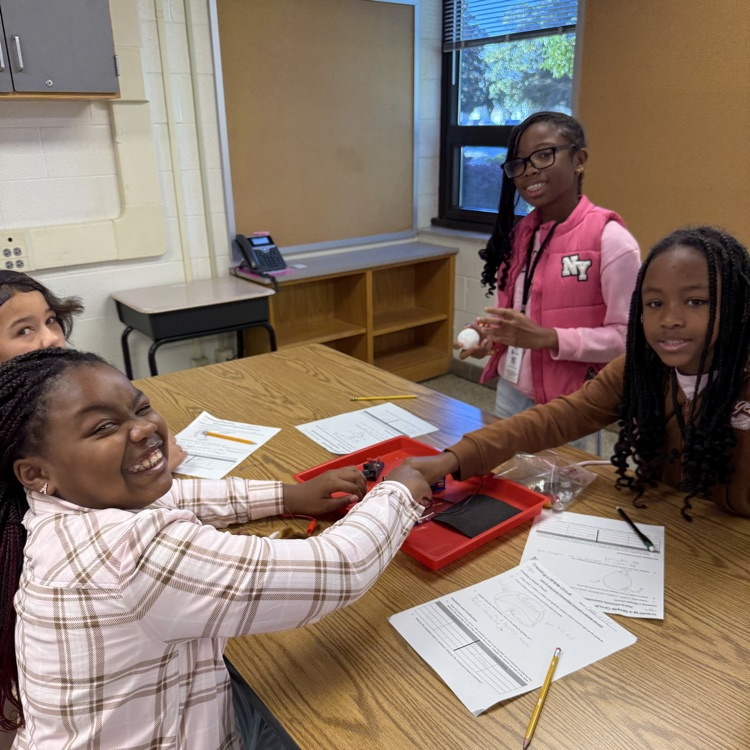 group of students working on circuit lab.