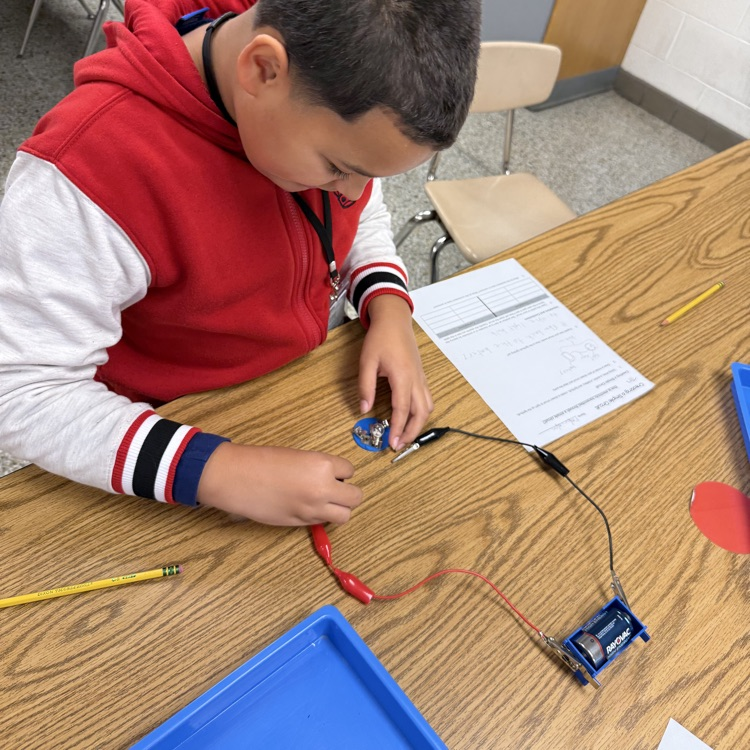 student building a circuit.