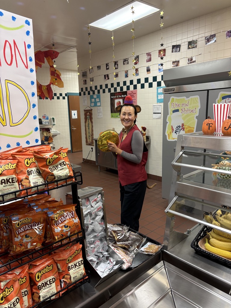 cafeteria worker dressed up as circus characters