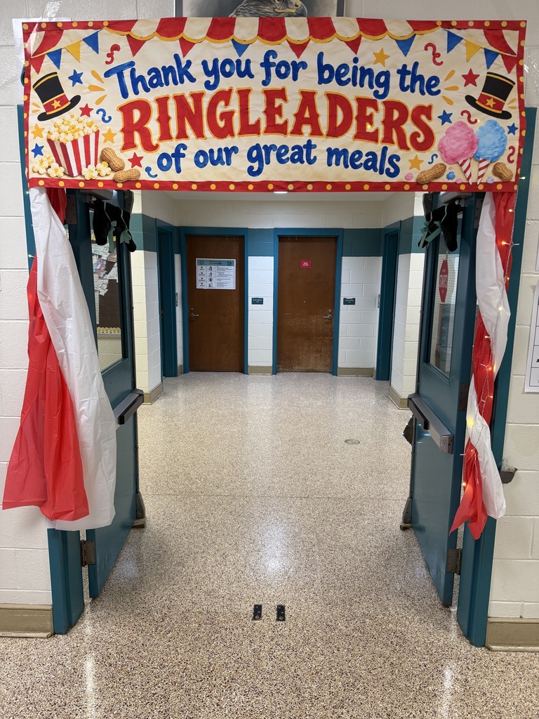 door to the cafeteria with circus sign 
