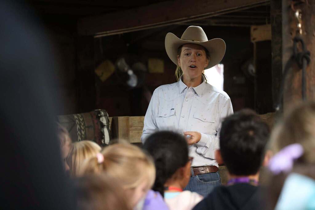 Ranch worker teaches students about life on the farm