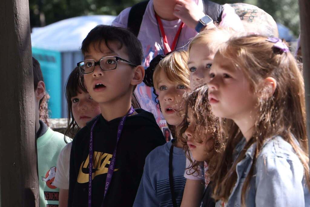 students are in awe as they learn about farm reptiles