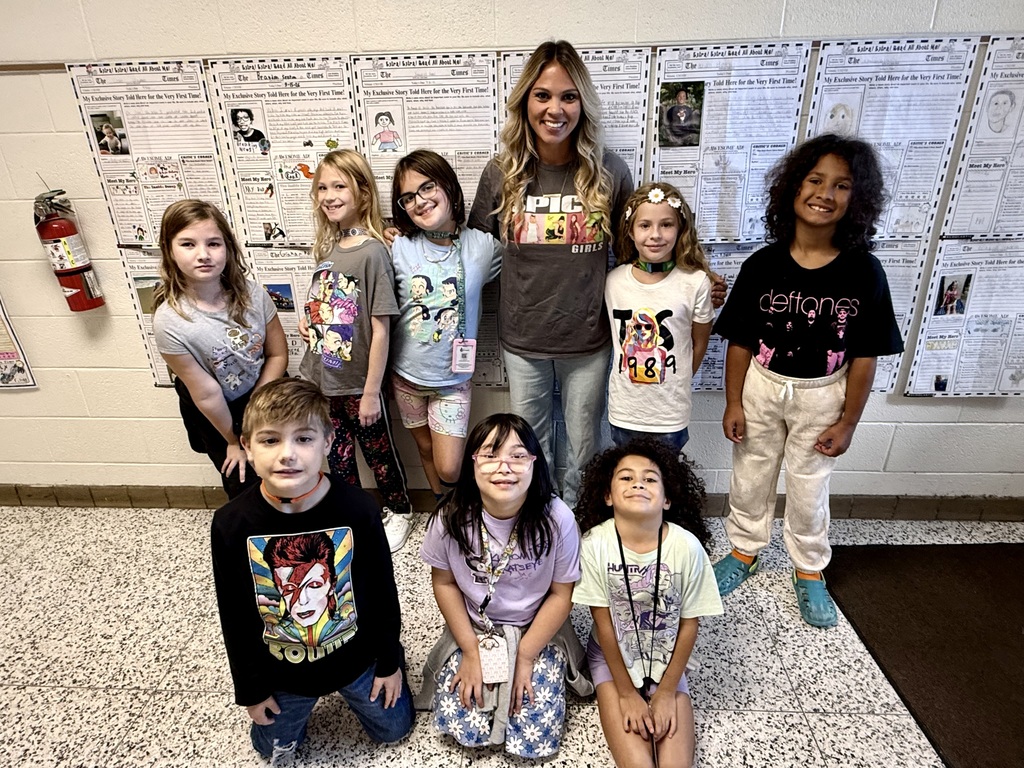 Kids in band shirts