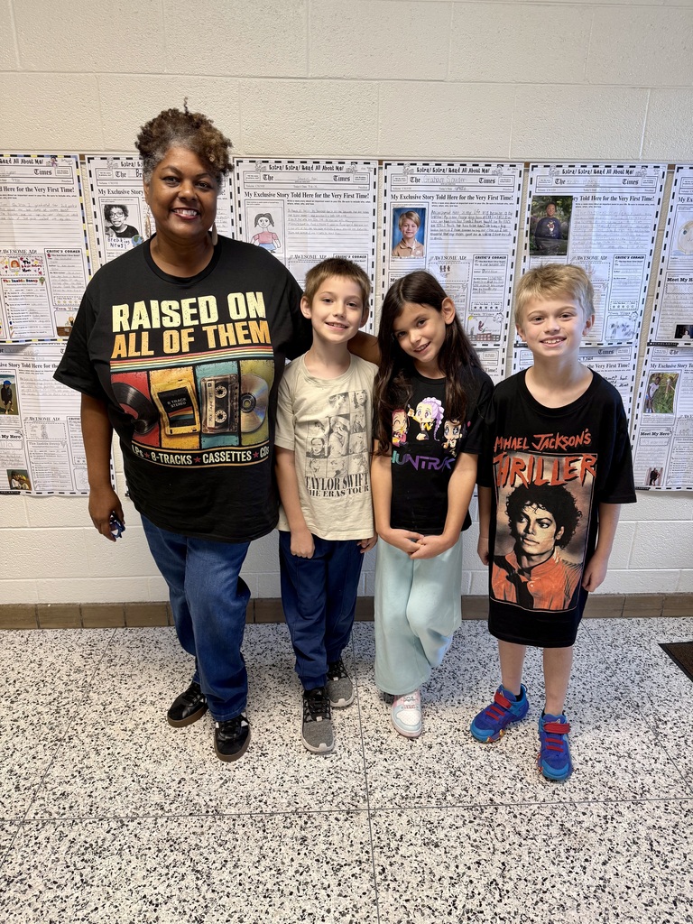 Kids in band shirts
