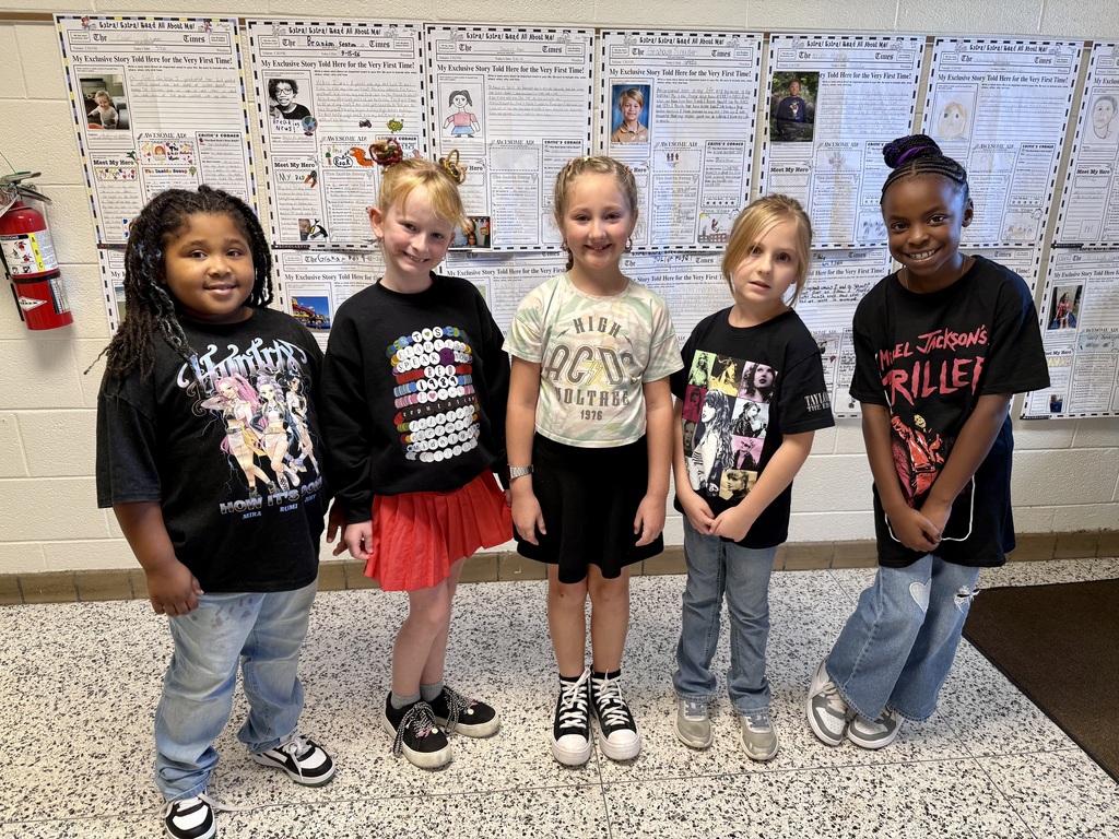Kids in band shirts