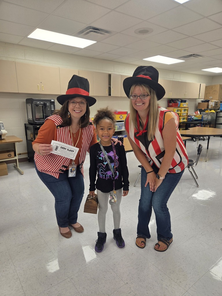 Mrs. Steadman, J'Myla and Mrs. Williamson with the first Treasure Box