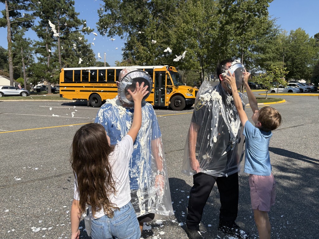 Students pie teachers in the face with whip cream 
