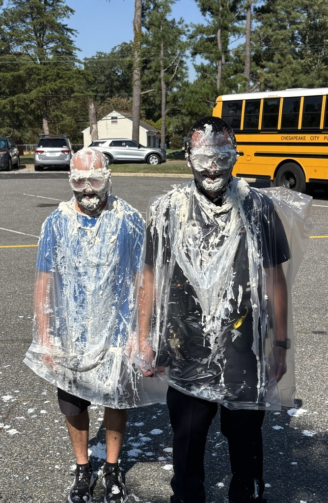 staff after they were pied in the face with whip cream 