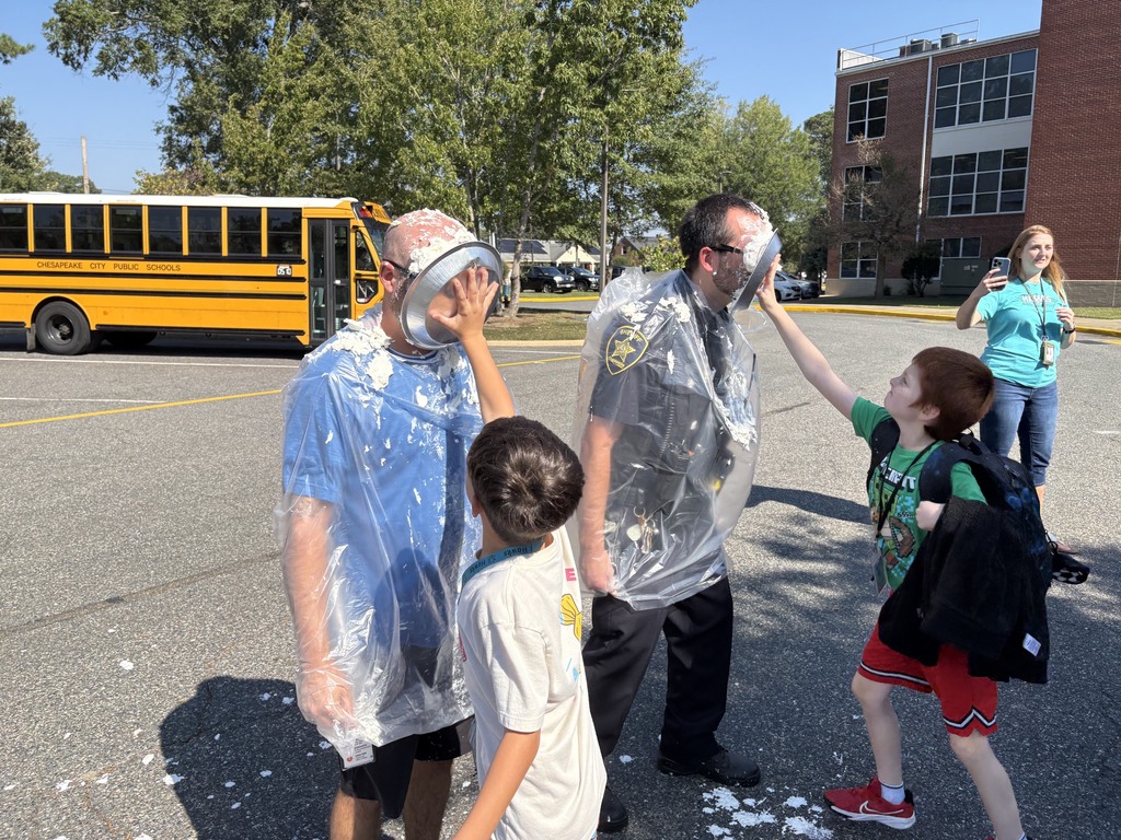 Students pie teachers in the face with whip cream 