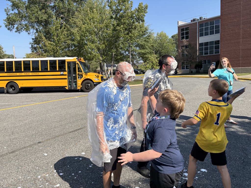 Students pie teachers in the face with whip cream 