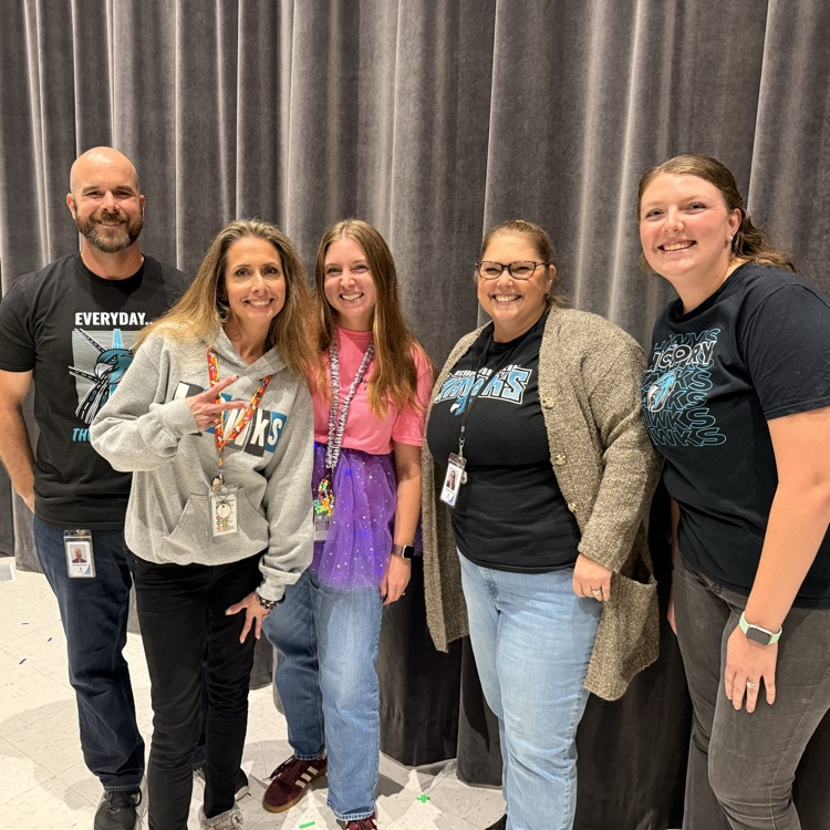 7th grade teacher competitors all smiles before the game
