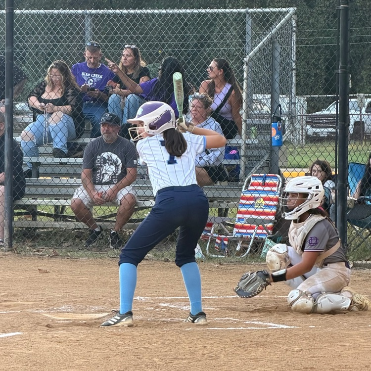 middle school girls playing softball 