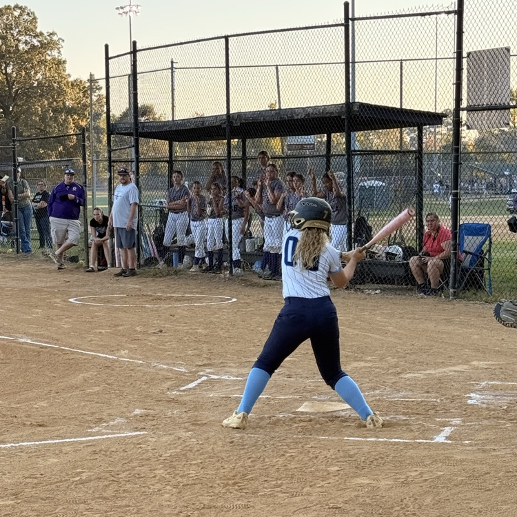 middle school girls playing softball 