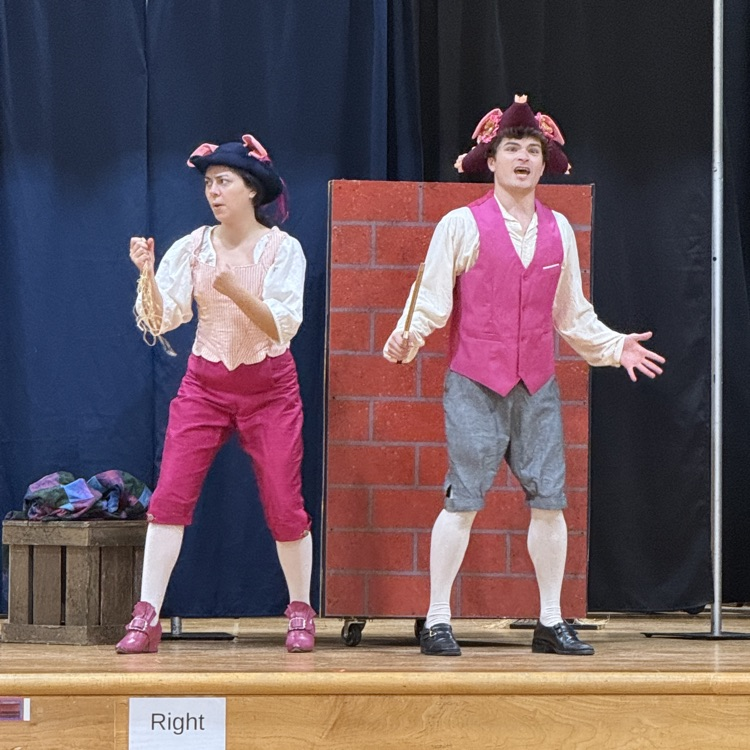 two Virginia Opera Performers dressed as little pigs.