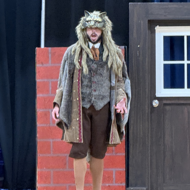 Virginia Opera performer dressed as the wolf